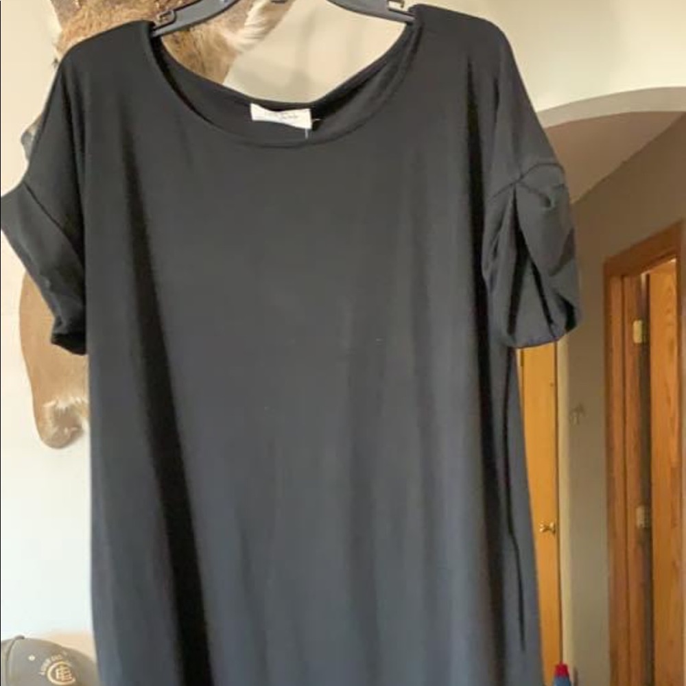 Black T shirt dress with pockets.